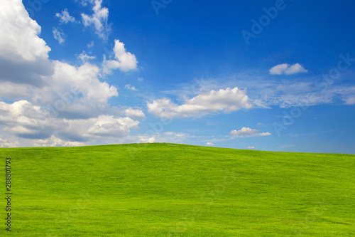 green hill on blue sky background