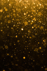 Abstract gold bokeh with black