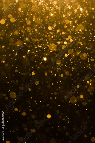 Abstract gold bokeh with black