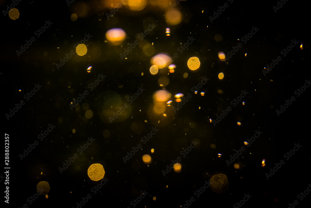 Obraz premium Blur bokeh of light on black