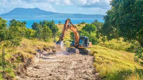 Obraz na plátne Showing environmental damage for the purpose of tourism, as a new public road is being constructed to provide access to develop virgin land in the Philippines