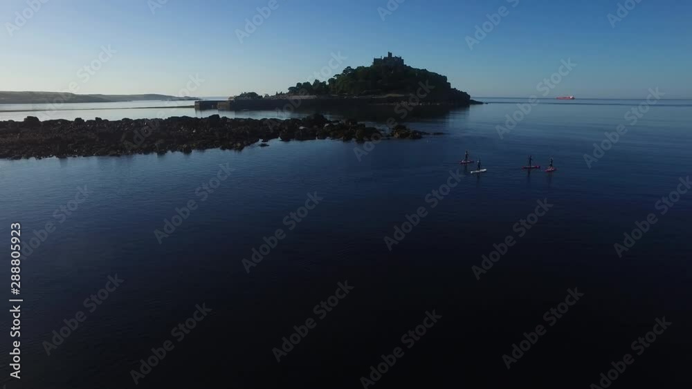 4K Drone shot of Paddle boarders at St Michael's Mount, Cornwall.