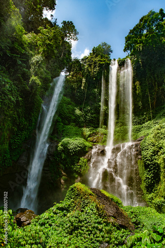 Beautiful Sekumpul Waterfall in the lush green TropicalBali jungle