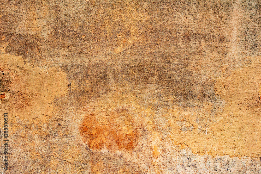 Texture of a concrete wall with cracks and scratches which can be used as a background Texture of a concrete wall with cracks and scratches which can be used as a background