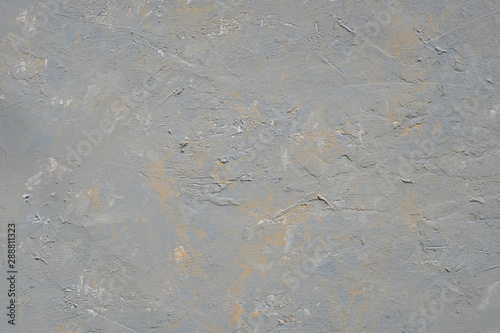 Close up texture of grey color painting on cement wall.