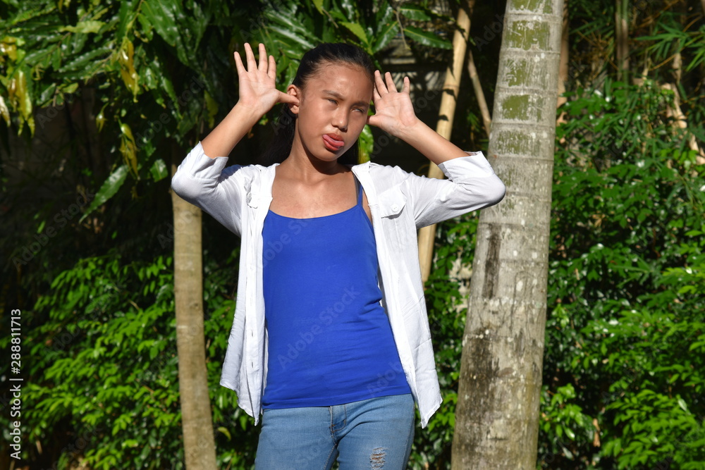 A Minority Youth Making Funny Faces A Minority Youth Making Funny Faces