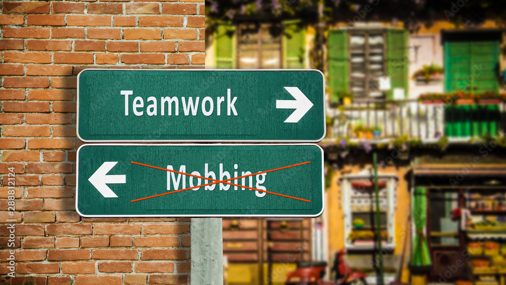 Street Sign to Teamwork versus Mobbing