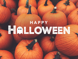Happy Halloween Text with Pumpkins Background