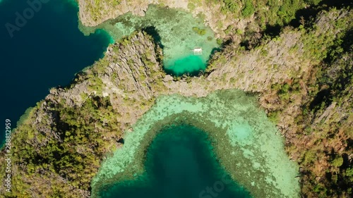 Aerial drone tropical lagoon with blue water among the rocks. lagoon, Kayangan Lake.mountains covered with forests. Seascape, tropical landscape. Palawan, Philippines, Busuanga