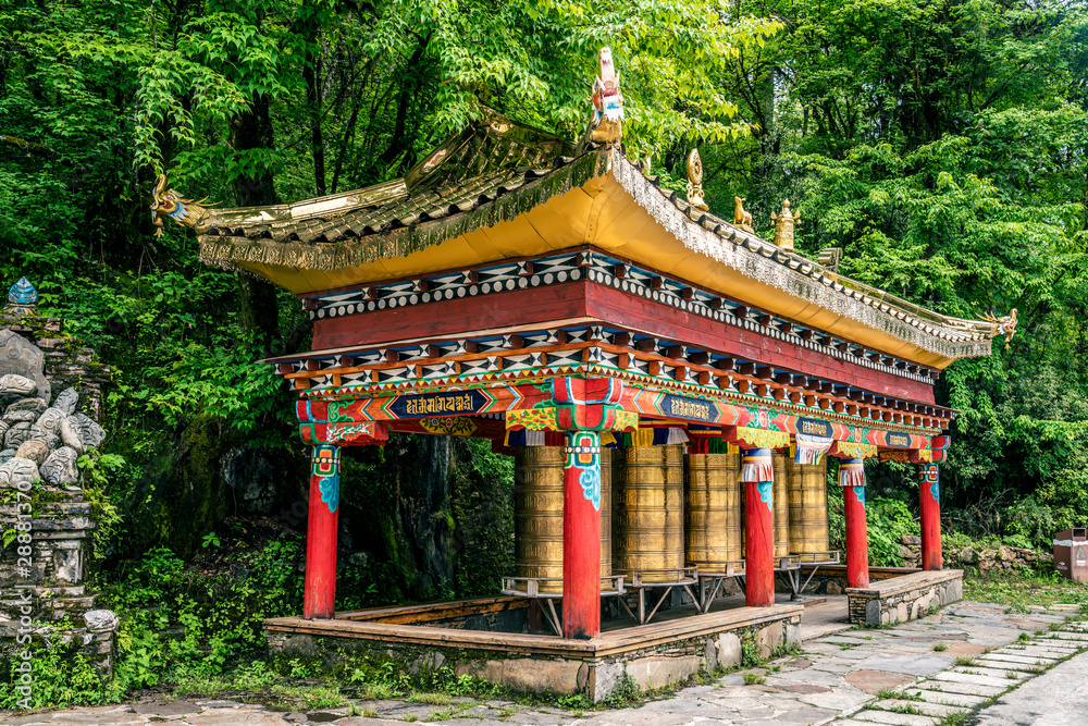 Golden prayer wheel of Dongga Temple, Hailuo, Sichuan, China Golden prayer wheel of Dongga Temple, Hailuo, Sichuan, China