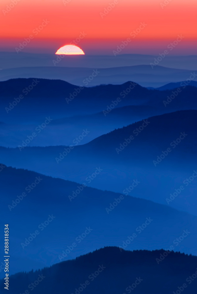 sunset scene in the mountains. Ceahlau, Romania