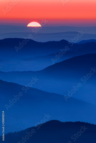 sunset scene in the mountains. Ceahlau, Romania