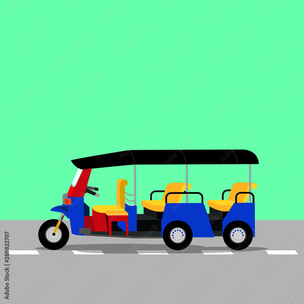 Three-wheeled tuk-tuk taxi on he road. 