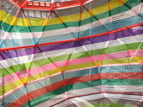 close-up of a multi colored chair made of plastic wire 2