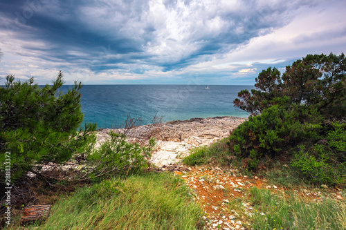 landscape with mediterranean coastline. The storm is approaching.
