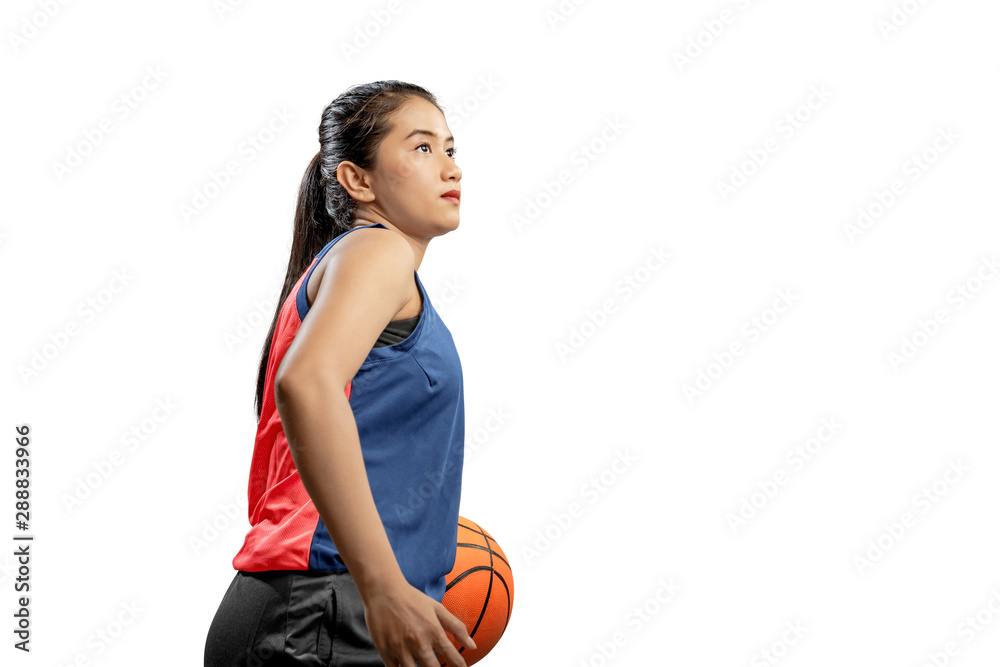 Asian woman basketball player holding the ball