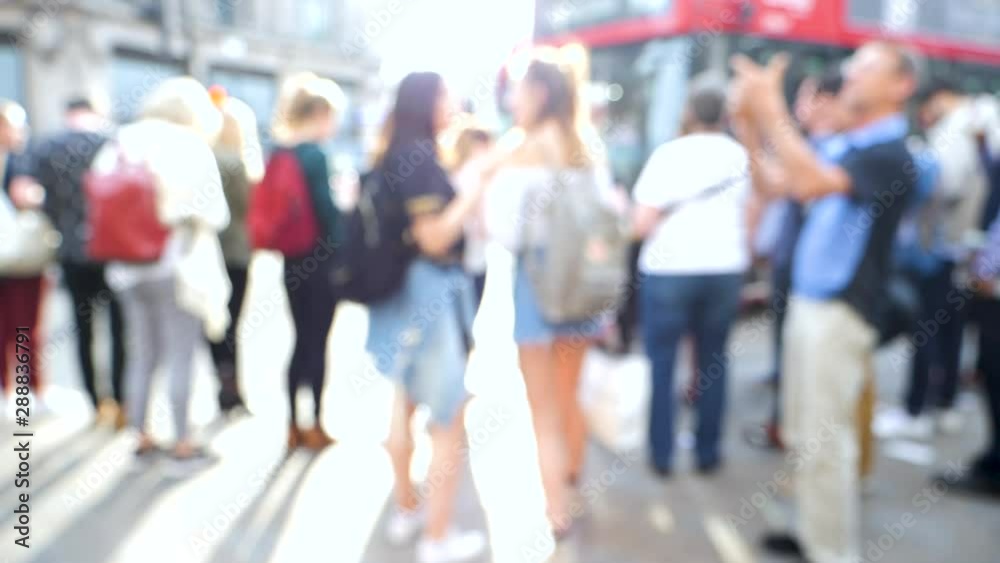 cinematic-slow-motion-defocused-silhouettes-of-pedestrians-people