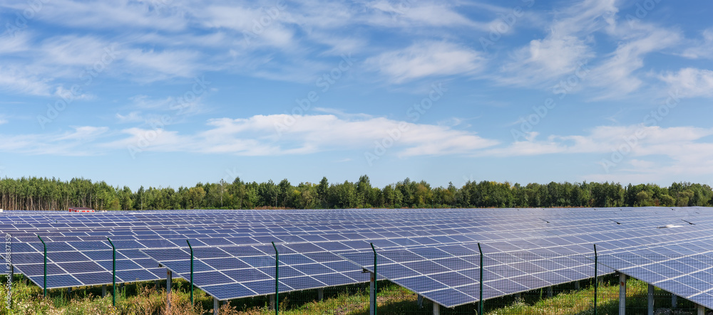 Panoramic view of part of ground-mounted solar power station