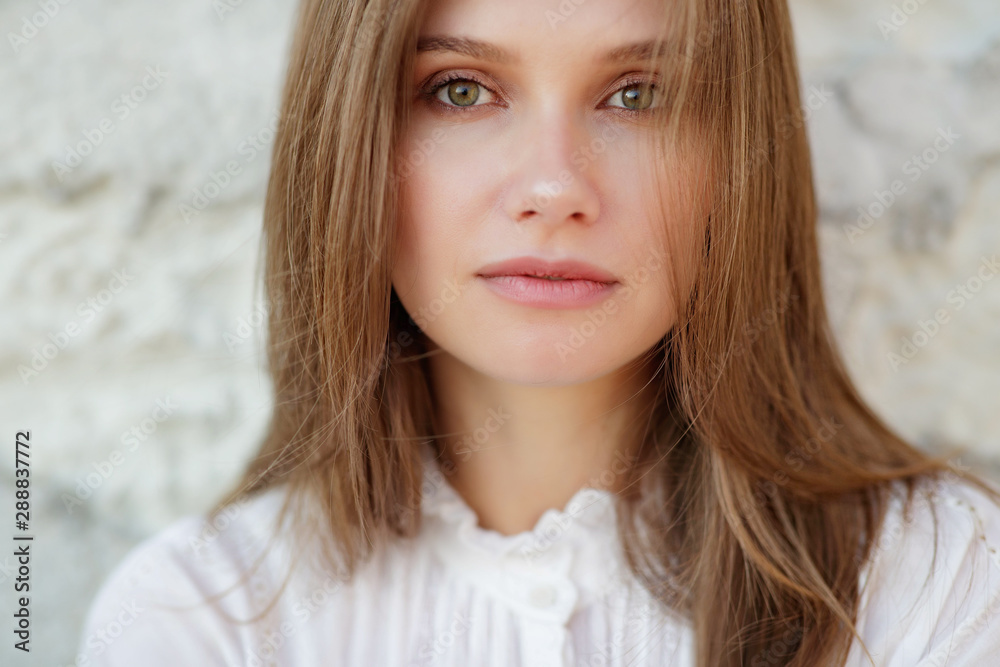 Fototapeta premium Beautiful woman. Portrait of a young beautiful woman. 
