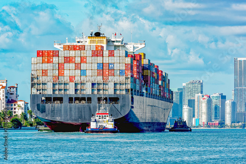 Container ship entering port photo