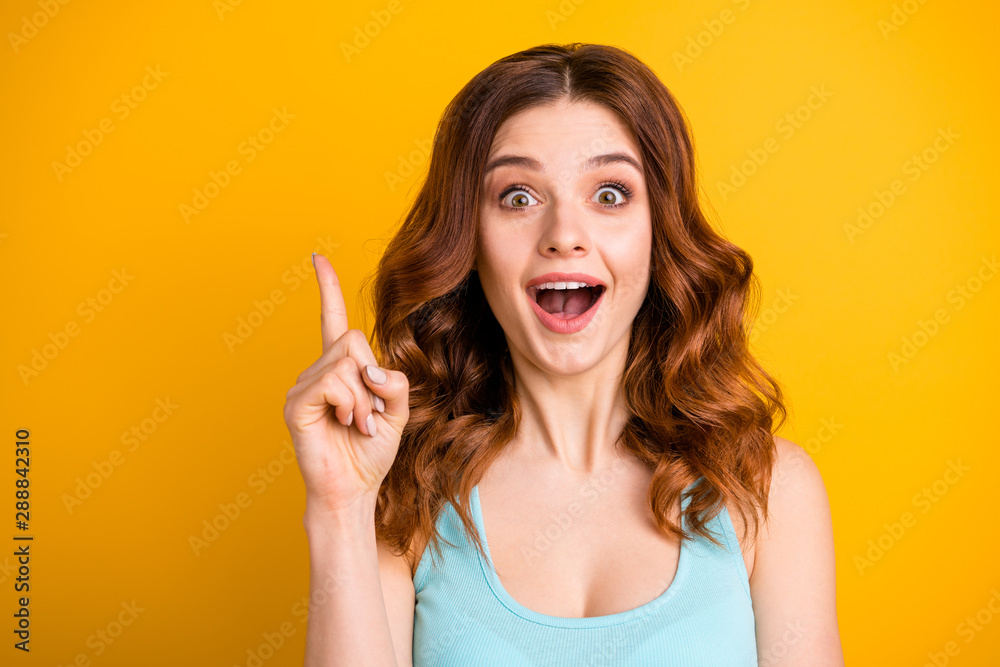 Photo of charming casual cute nice beautiful attractive pretty sweet lovely trendy white girlfriend wearing turquoise singlet pointing up after realizing while isolated over yellow background - obrazy, fototapety, plakaty 