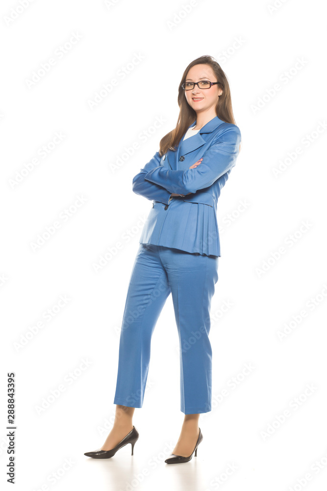 Young smiling business woman with crossed arms standing on white background Young smiling business woman with crossed arms standing on white background