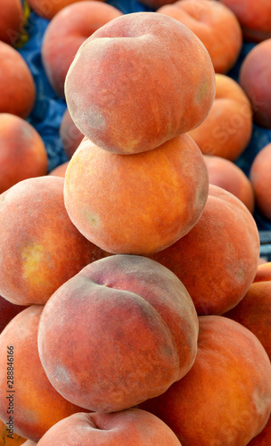 organic and fresh peaches at the market