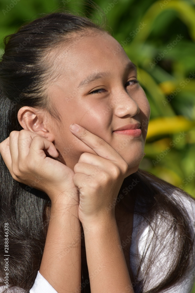 Young Filipina Teen Girl Decision Making Young Filipina Teen Girl Decision Making