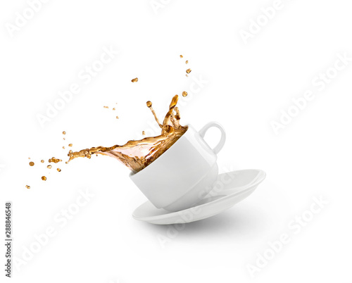 coffee splash in white cup isolated