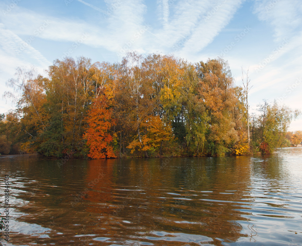 Autumn landscape with the forest and the river