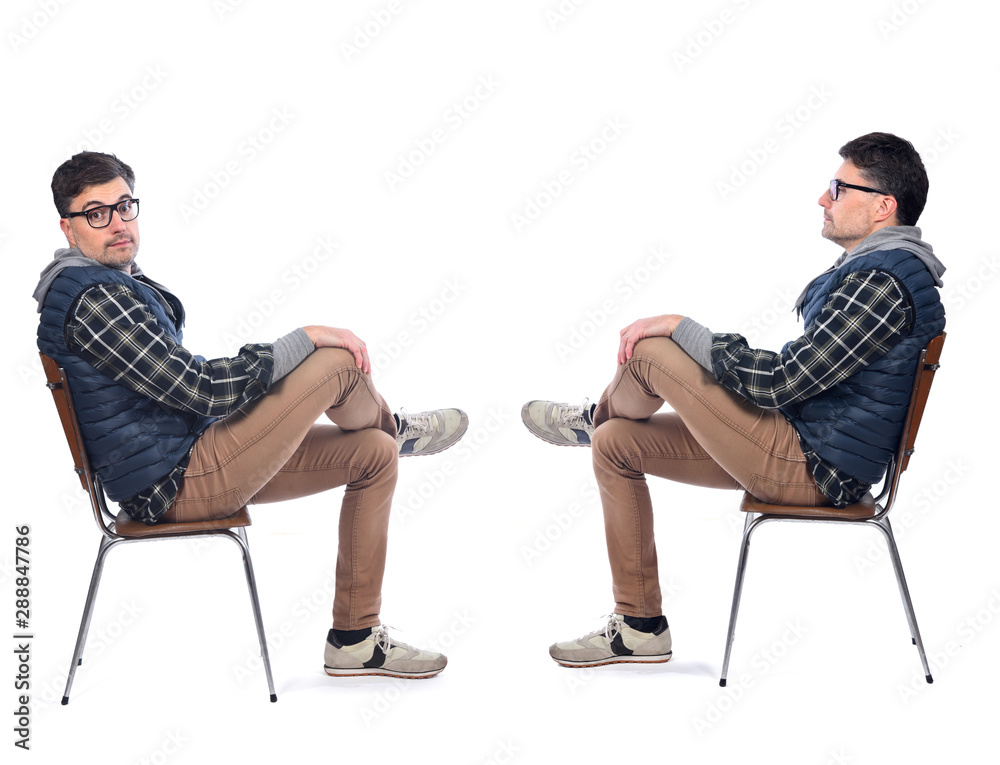 man sitting on a chair in white background
