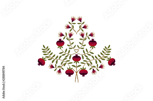  Embroidery satin stitch bouquet with flowers and fruits of red pomegranates on bent twigs with green leaves on white background