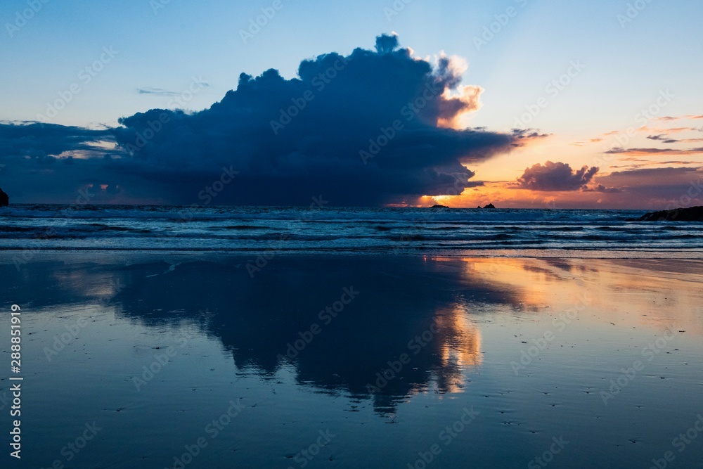 striking clouds reflected at sunset in Cornwall