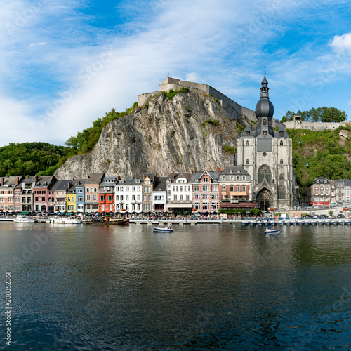 view of the small town of Dinant with Maas river and citadel and cathedral in the old town