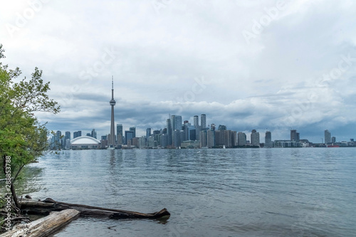 Bild auf Leinwand Waterfront view of Toronto City Skyscrapers along with CN Towerand Rogers Centre