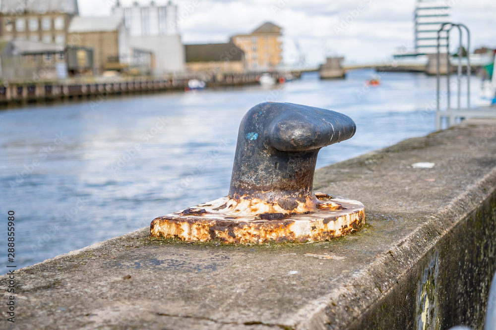 Great Yarmouth, Norfolk, UK – September 08 2019. Close up of mooring ring with out of focus background