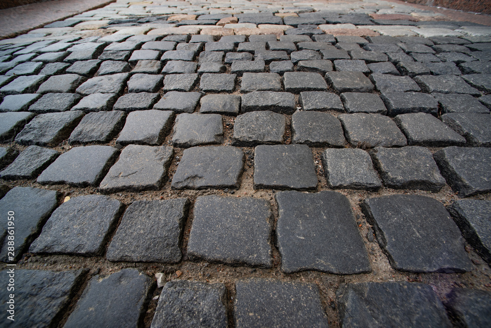Texture of square paving stones in perspective