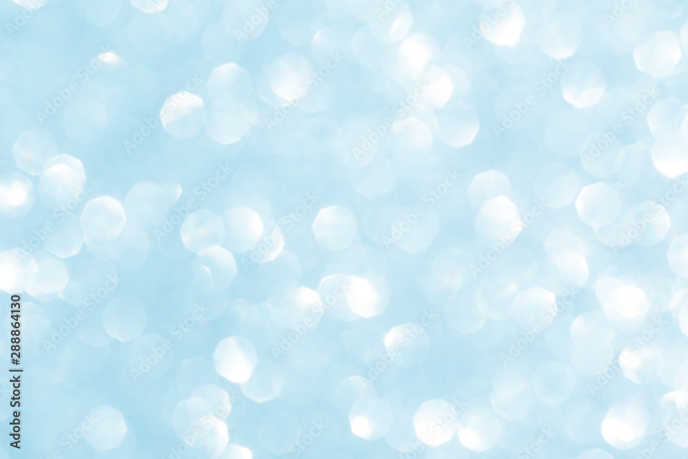 Abstract blue glitter background. Sparkle blue bokeh christmas or winter background. Abstract blue glitter background. Sparkle blue bokeh christmas or winter background.
