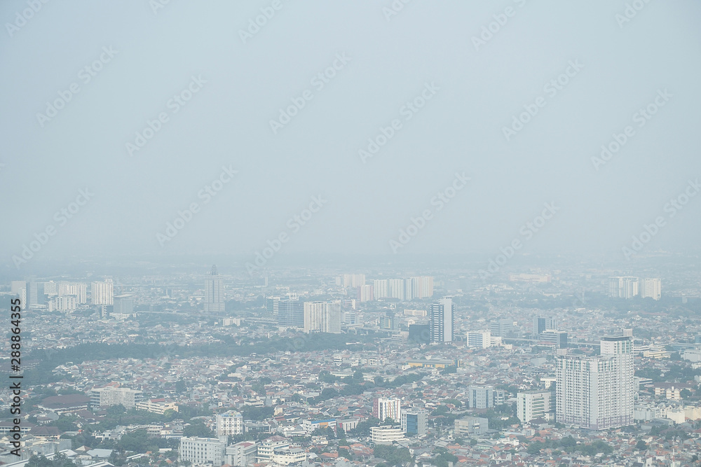 Smog dust air pollution in city of Jakarta, Indonesia