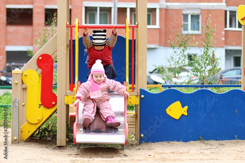 Children play on the playground © alexkich