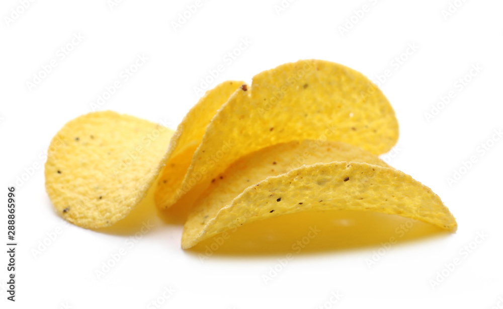 Corn tortilla chips pile isolated on white background