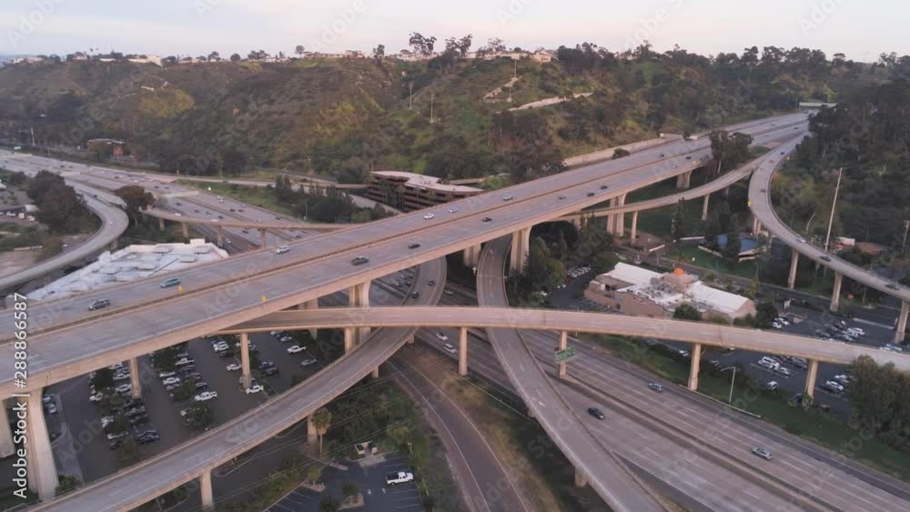 Road junction between two freeways. Top view. Aerial, drone shot Road junction between two freeways. Top view. Aerial, drone shot