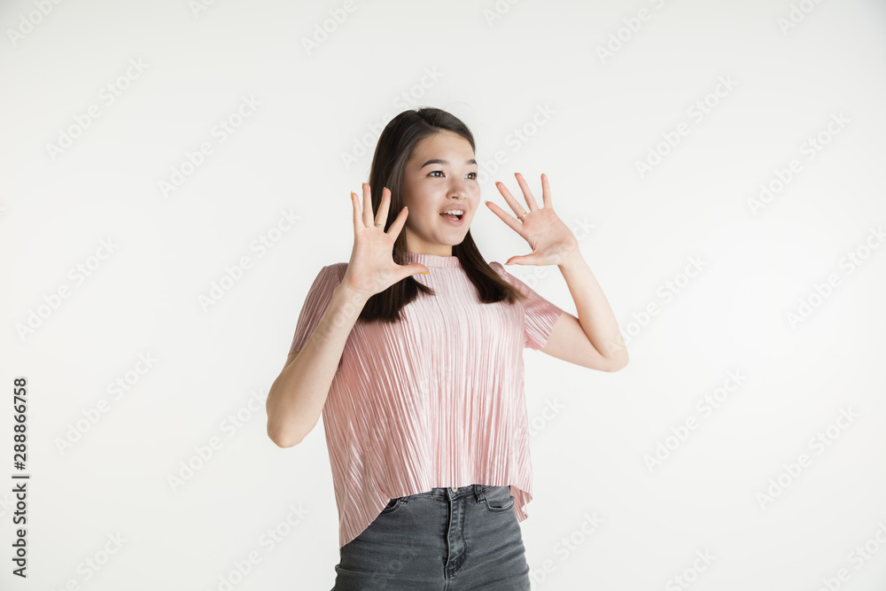 Beautiful female half-length portrait isolated on white studio background. Young emotional woman in casual clothes. Human emotions, facial expression concept. Astonished, wondered, calling for sales. Beautiful female half-length portrait isolated on white studio background. Young emotional woman in casual clothes. Human emotions, facial expression concept. Astonished, wondered, calling for sales.