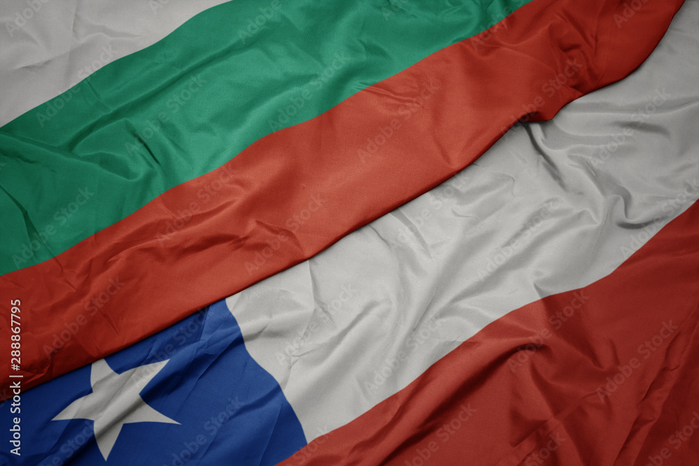 waving colorful flag of chile and national flag of bulgaria.