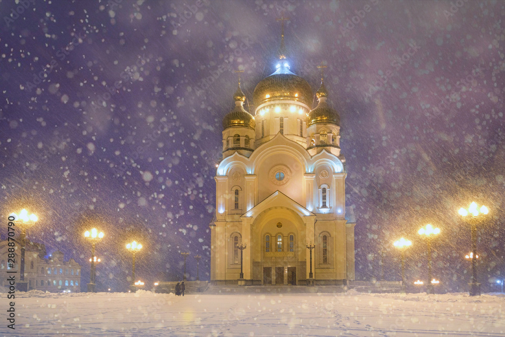 Blizzard in the city. Khabarovsk. Transfiguration Cathedral. Far East, Russia. Blizzard in the city. Khabarovsk. Transfiguration Cathedral. Far East, Russia.