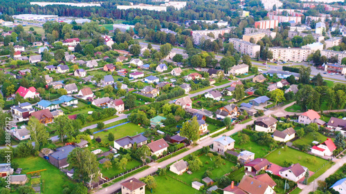 Aerial view of the city. Hundreds of houses bird eye view suburb urban housing development.