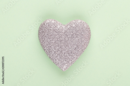 Christmas decor. Christmas decorations on pastel background. Flat lay, top view, copy space.