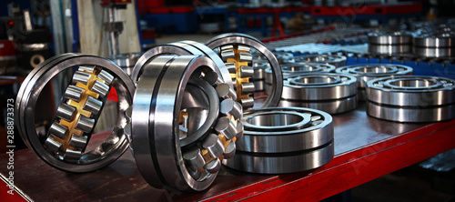 Production of bearings at the factory. Chrome plated surface. Industrial theme.Photos at the factory.Banner photo