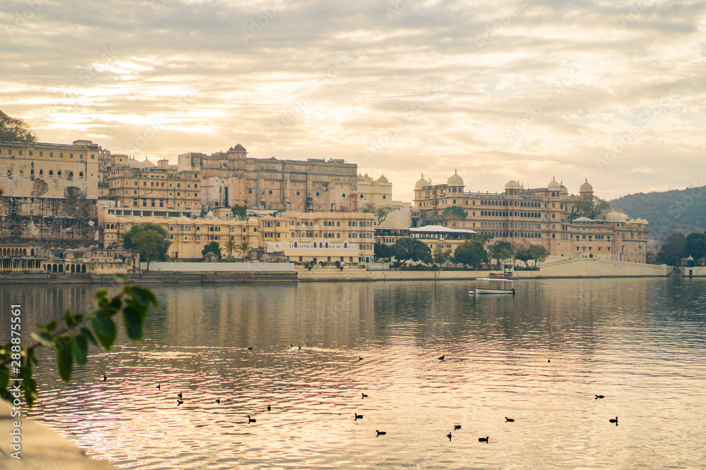 Lake Pichola and Old City Palace , early morning view from Ambrai Ghat in Udaipur, Rajasthan, India