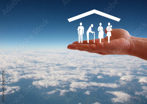 Weak social categories welfare concept with hand and roof on aerial sky view background